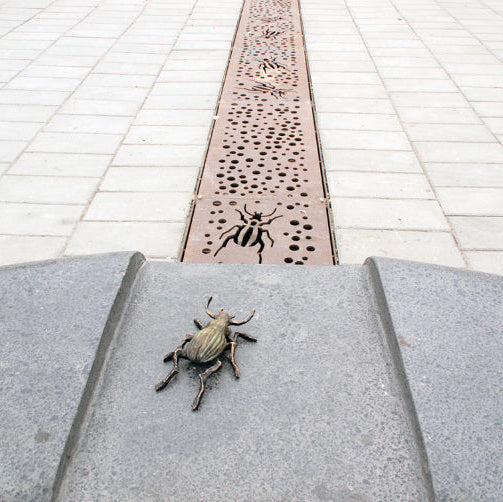 Bronskulptur Praktsammetslöparen